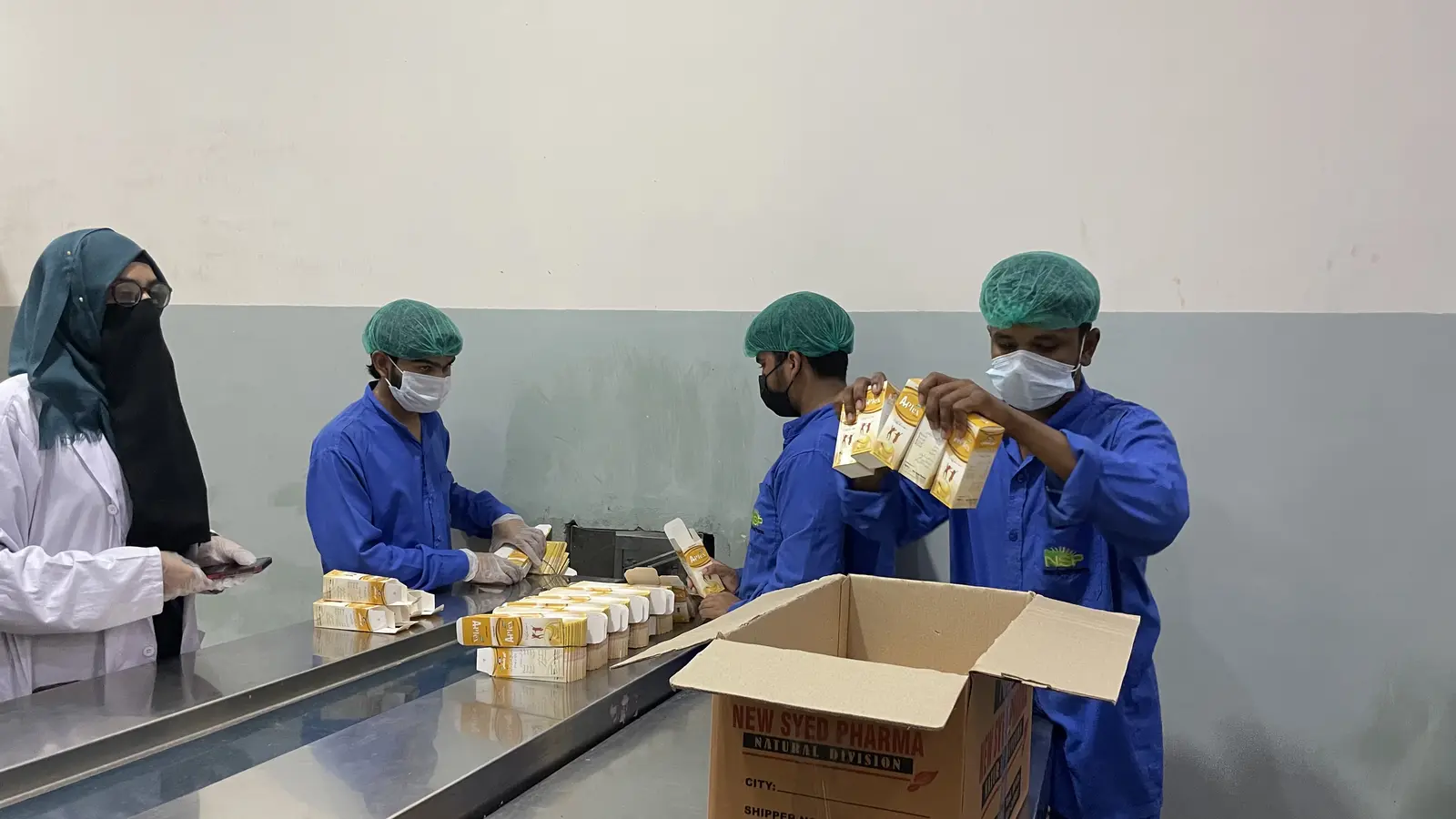 New Syed Pharma packing hall, product labeling and boxing, Muridke Pakistan
