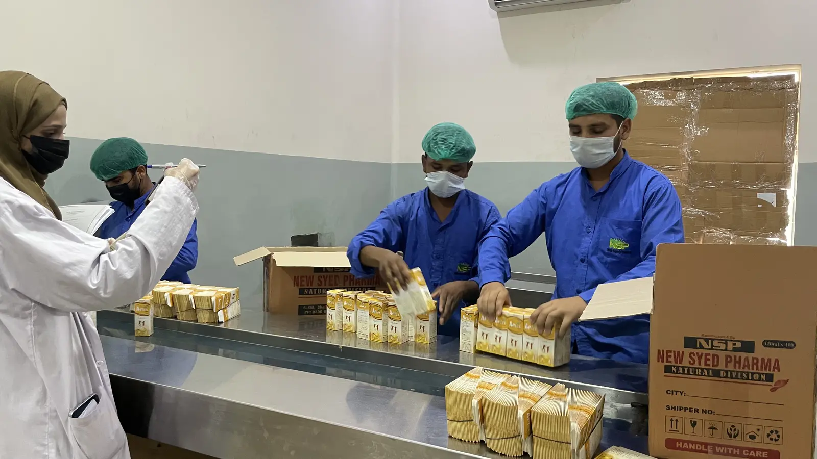 New Syed Pharma packing hall, product labeling and boxing, Muridke Pakistan