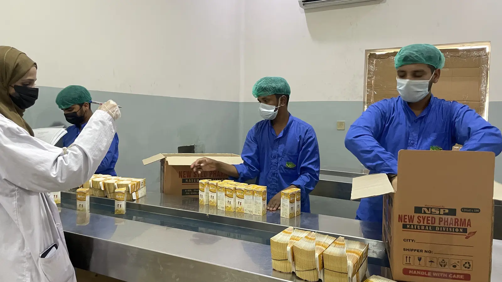 New Syed Pharma packing hall, product labeling and boxing, Muridke Pakistan