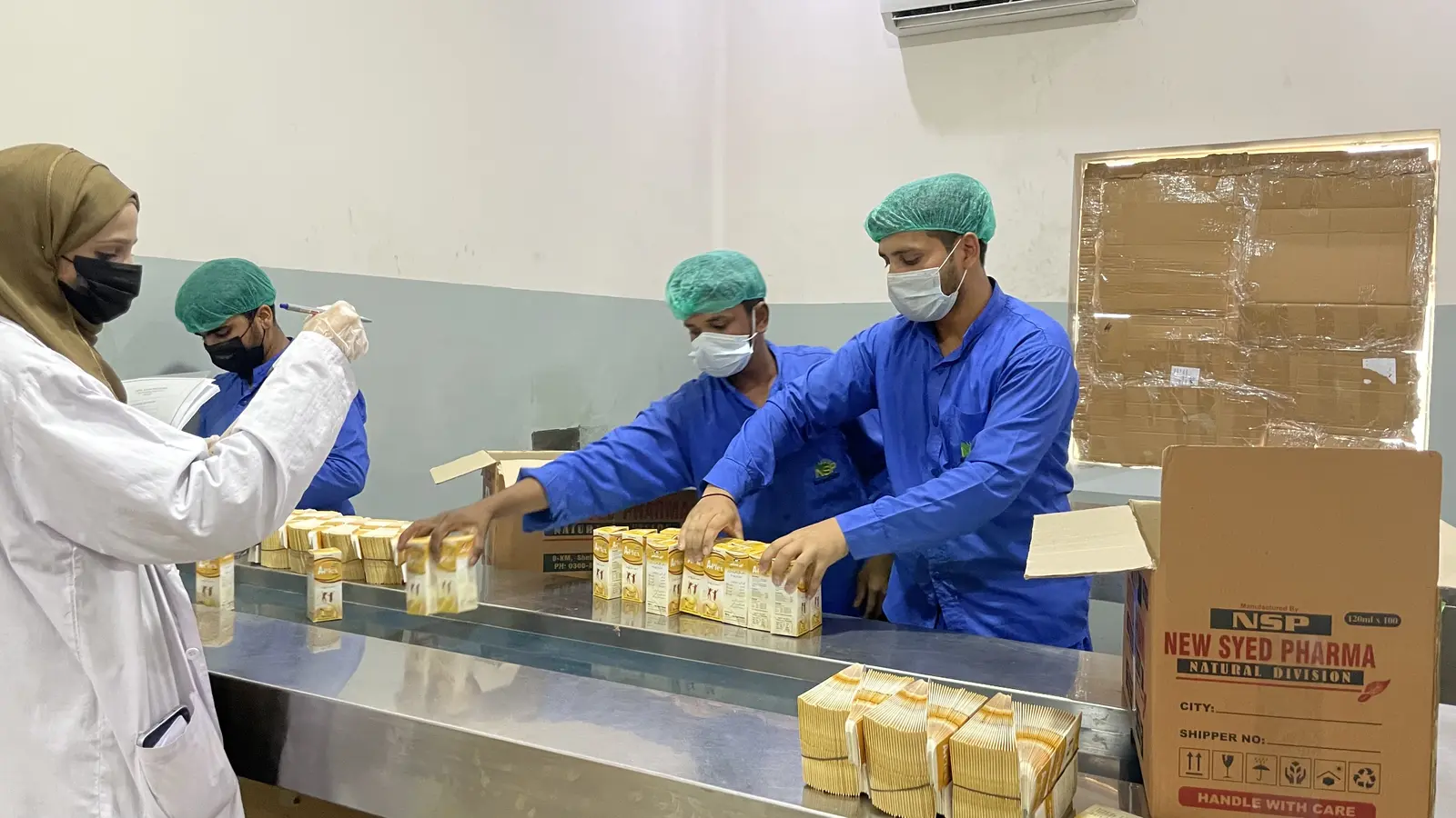 New Syed Pharma packing hall, product labeling and boxing, Muridke Pakistan