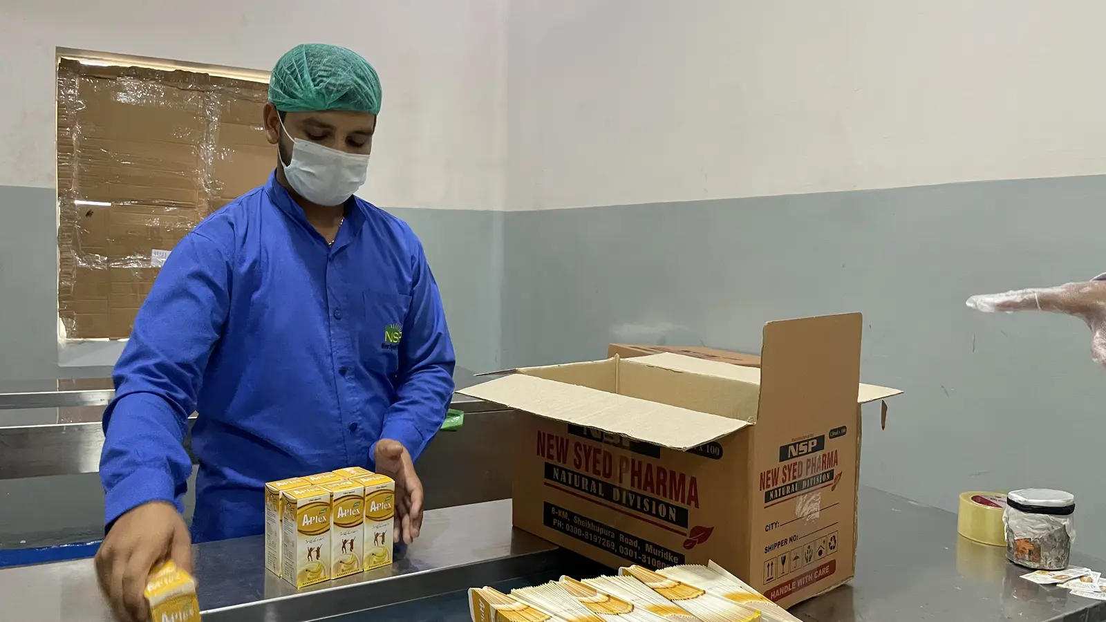 New Syed Pharma packing hall, product labeling and boxing, Muridke Pakistan