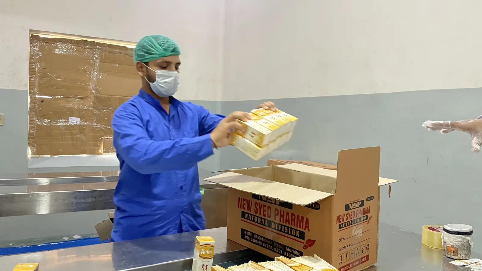 New Syed Pharma packing hall, product labeling and boxing, Muridke Pakistan
