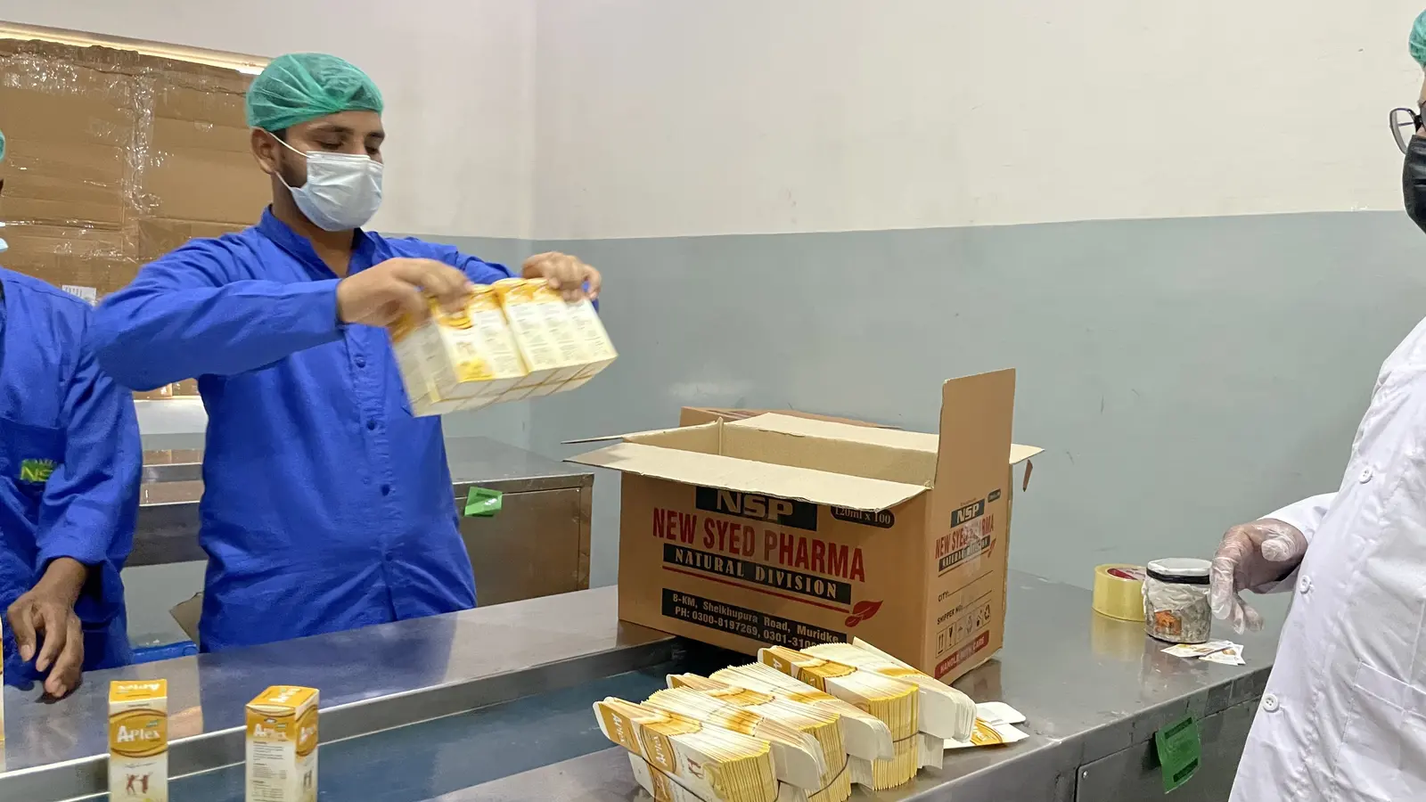 New Syed Pharma packing hall, product labeling and boxing, Muridke Pakistan