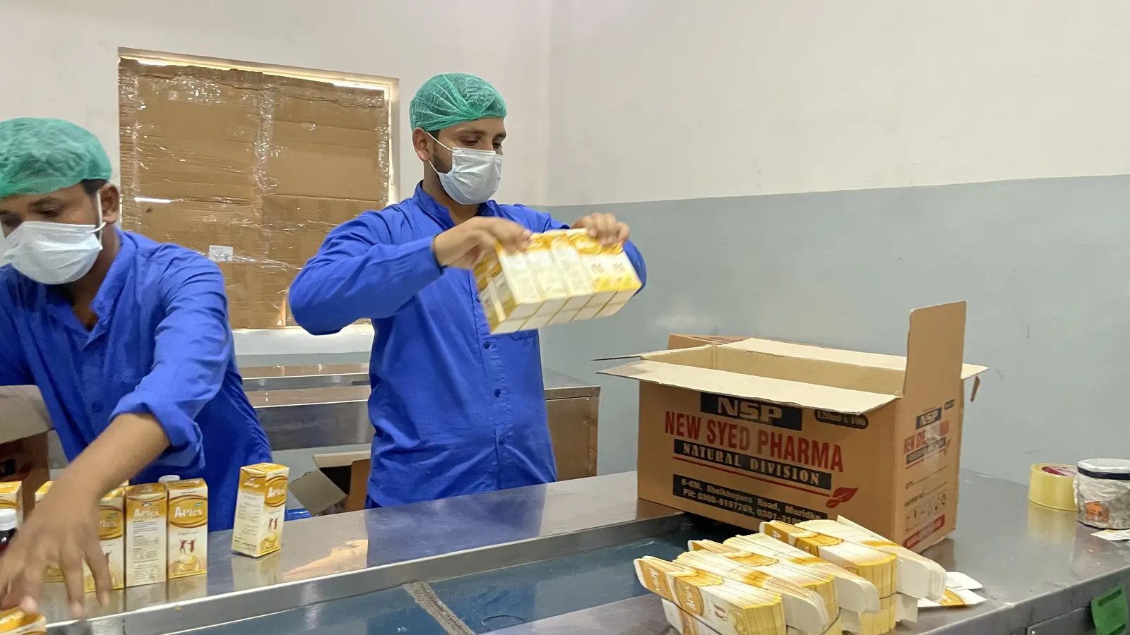 New Syed Pharma packing hall, product labeling and boxing, Muridke Pakistan